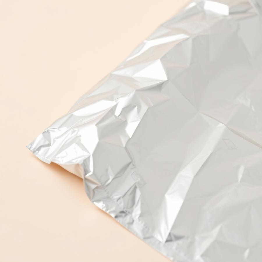 Close-up of aluminium foil sheet texture